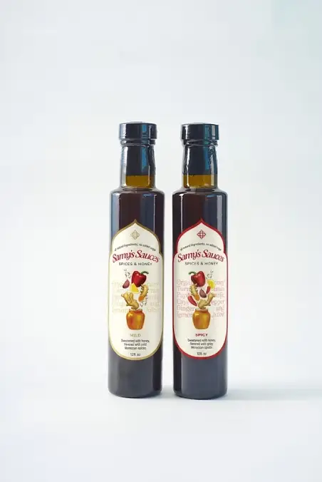 Two bottles of Samy's Sauces